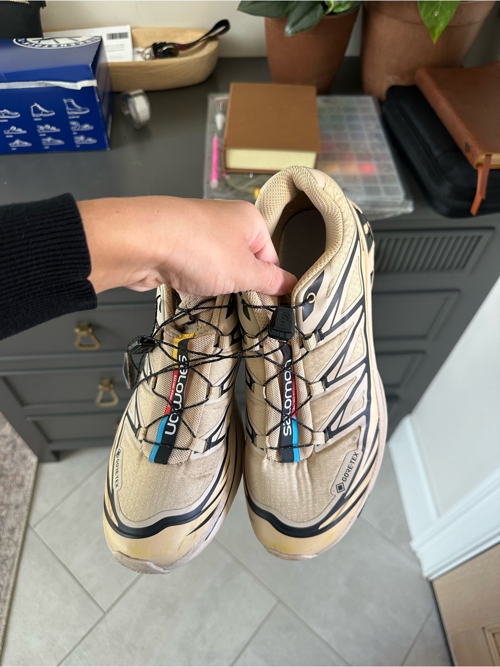 Salomon woman’s Beige Trail Shoes with Black and Blue Accents